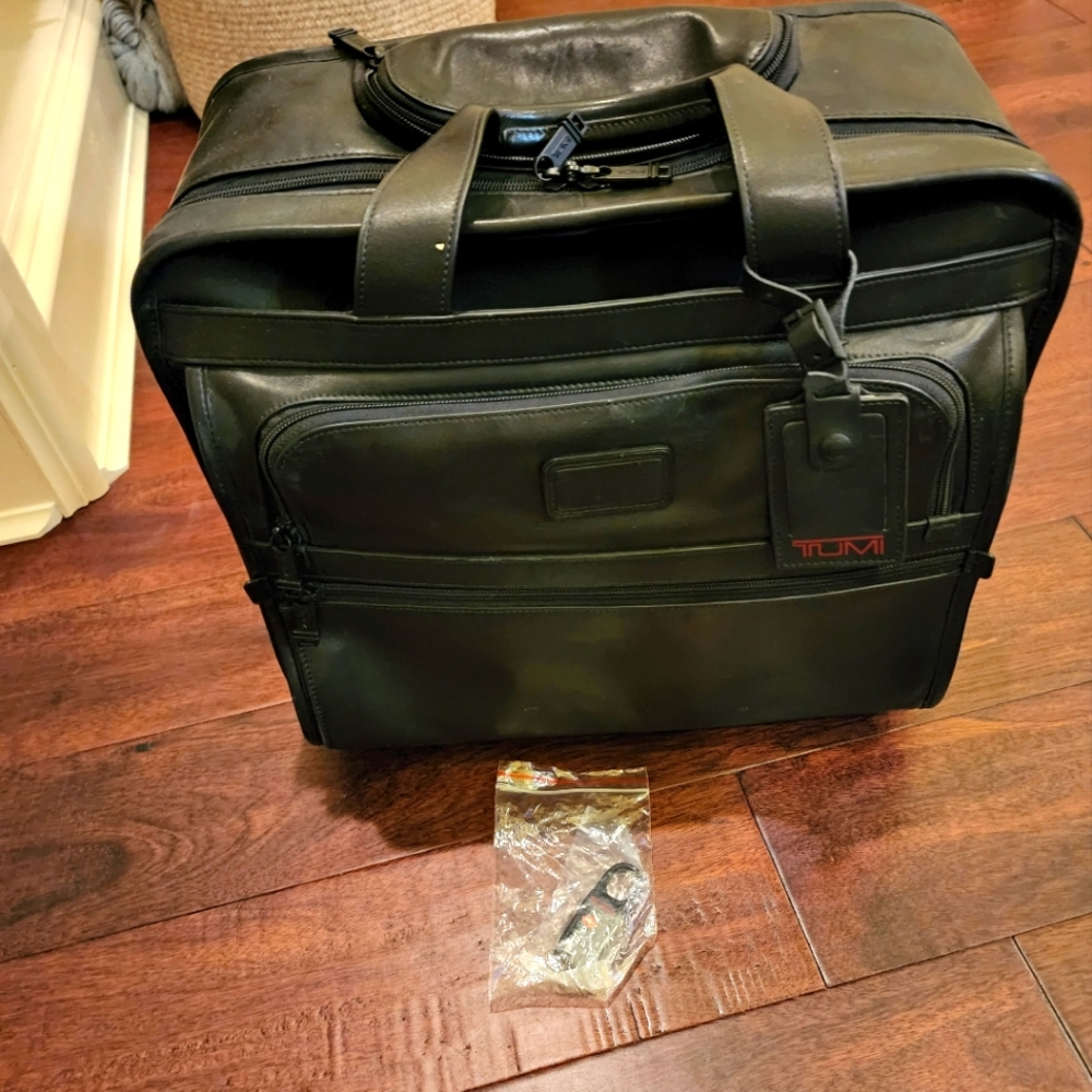 Leather Tumi rolling briefcase